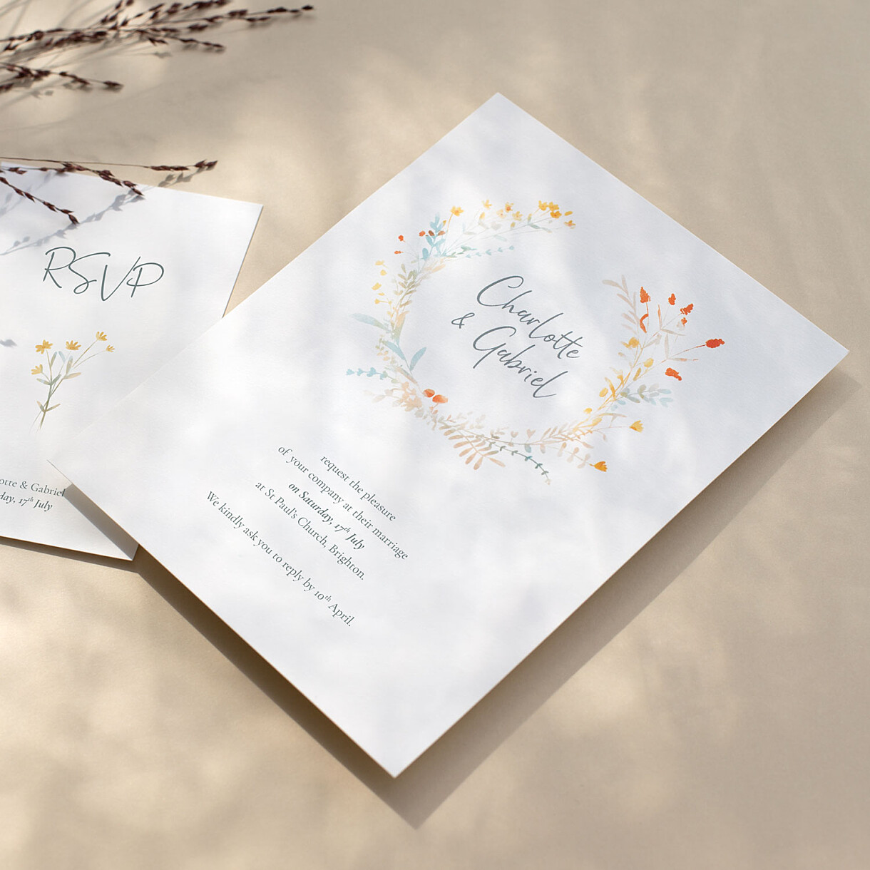 Wildflower wreath wedding invitations